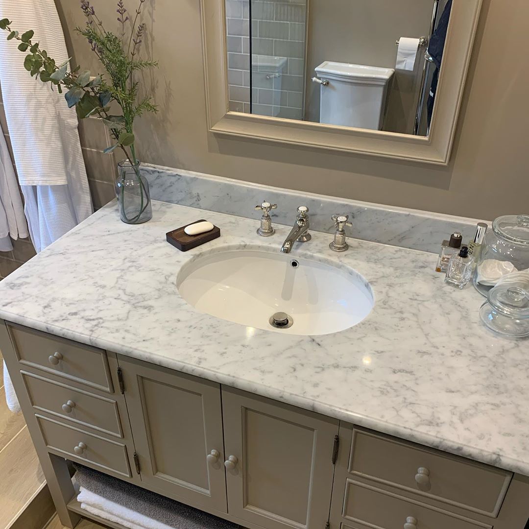 Bathroom installation with large vanity unit