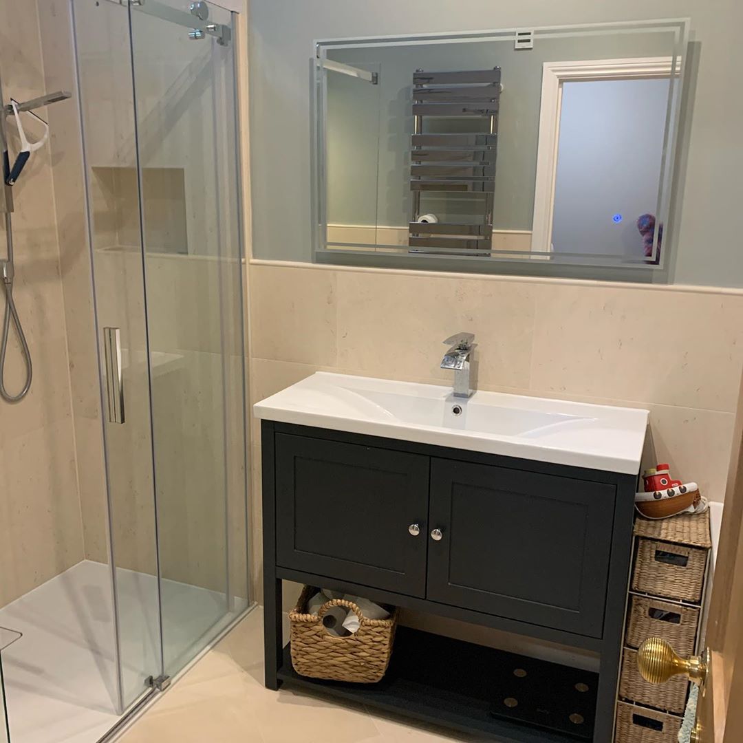 Bathroom installation with tiling and storage
